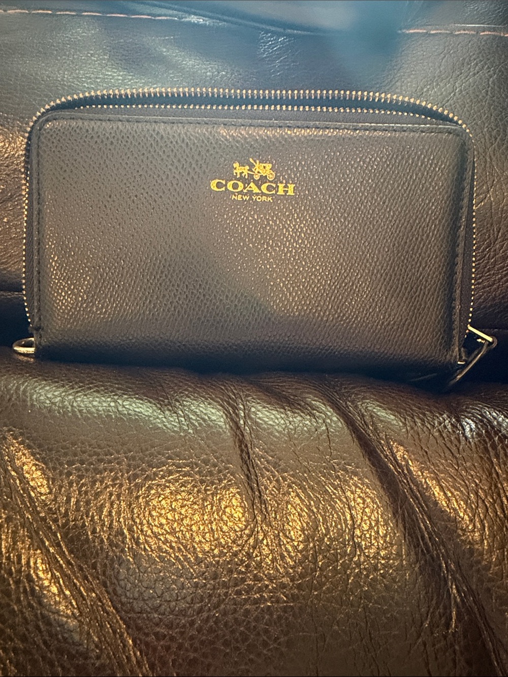 Coach Black Pebbled Zip-Around Wallet with Gold Logo